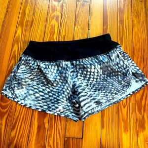 Nike lined running shorts - lots of pockets, one zippered
